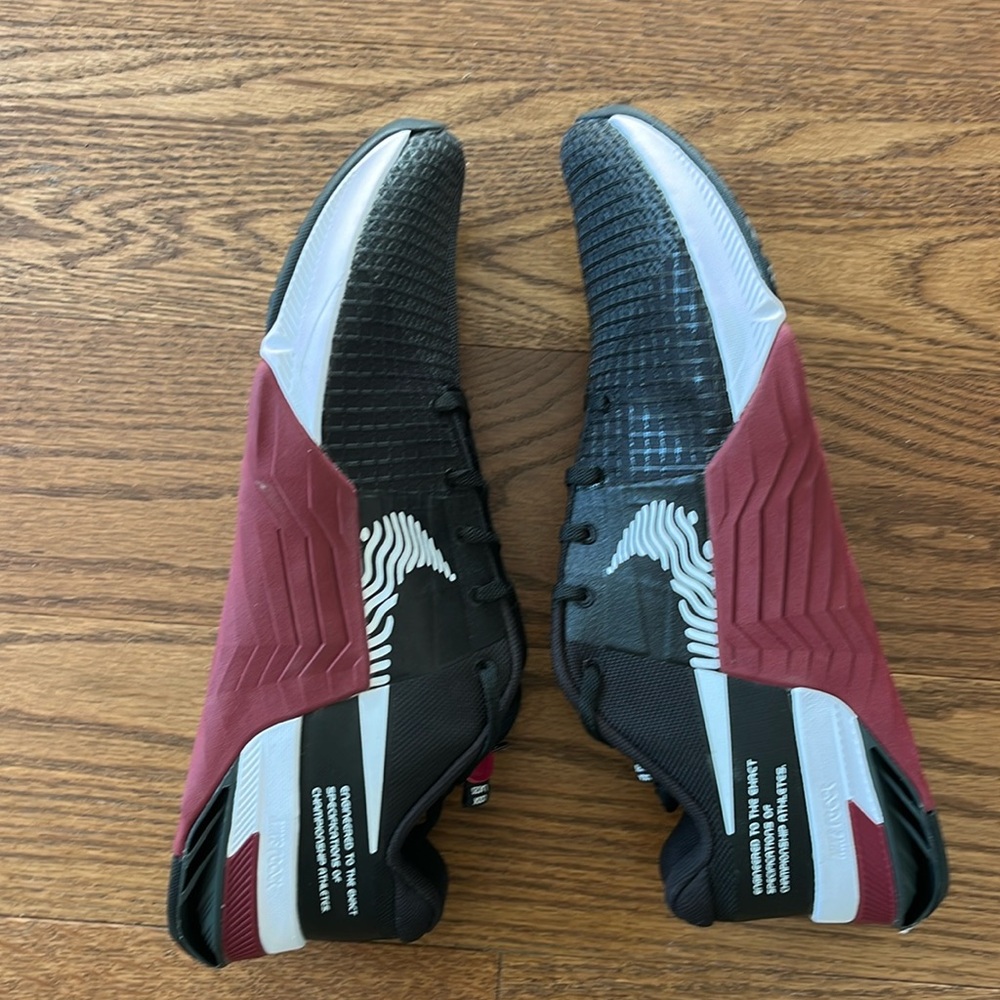 Men's Nike Black and Burgundy Metron Sneakers.